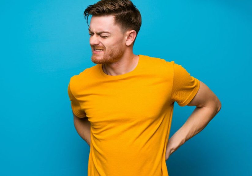 man suffering with back pain